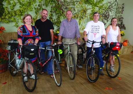 Avid cyclists Traci Huckaby, Trey Woodall, Ian Flitcroft, Lee Russell, and Michelle Cannon all traded four wheels for two for the entire month of October for the Bike to Work Challenge. Image Credit: Rick Blackshear 