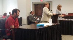 Michael Bowman, who stands accused of murdering Officer Kevin Jordan, of the Griffin Police Department, listened to arguments during his Tuesday afternoon preliminary hearing held before Spalding County Chief Magistrate Judge Rita Cavanaugh. Bowman is represented by Public Defender Diana Davis, center, and Spalding County Senior Assistant District Attorney Kimberly Schwartz, standing far right, is prosecuting the case on behalf of the state of Georgia.
